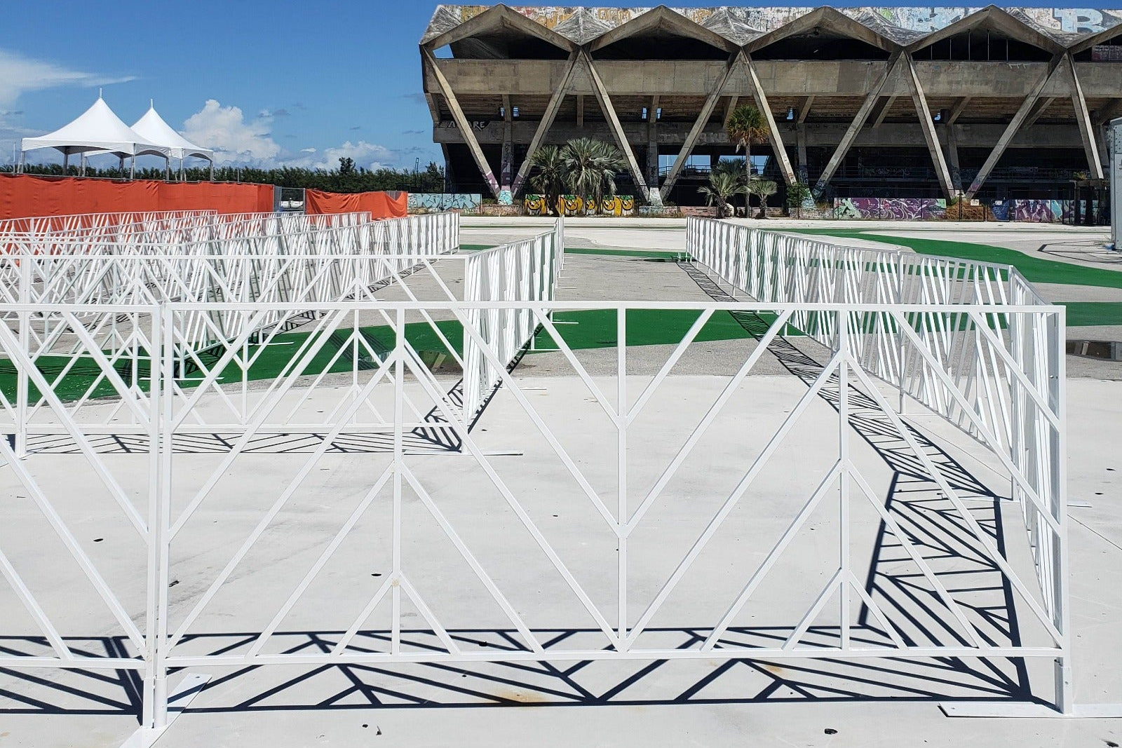 White Dynamic Barrier fencing set up outside of a stadium